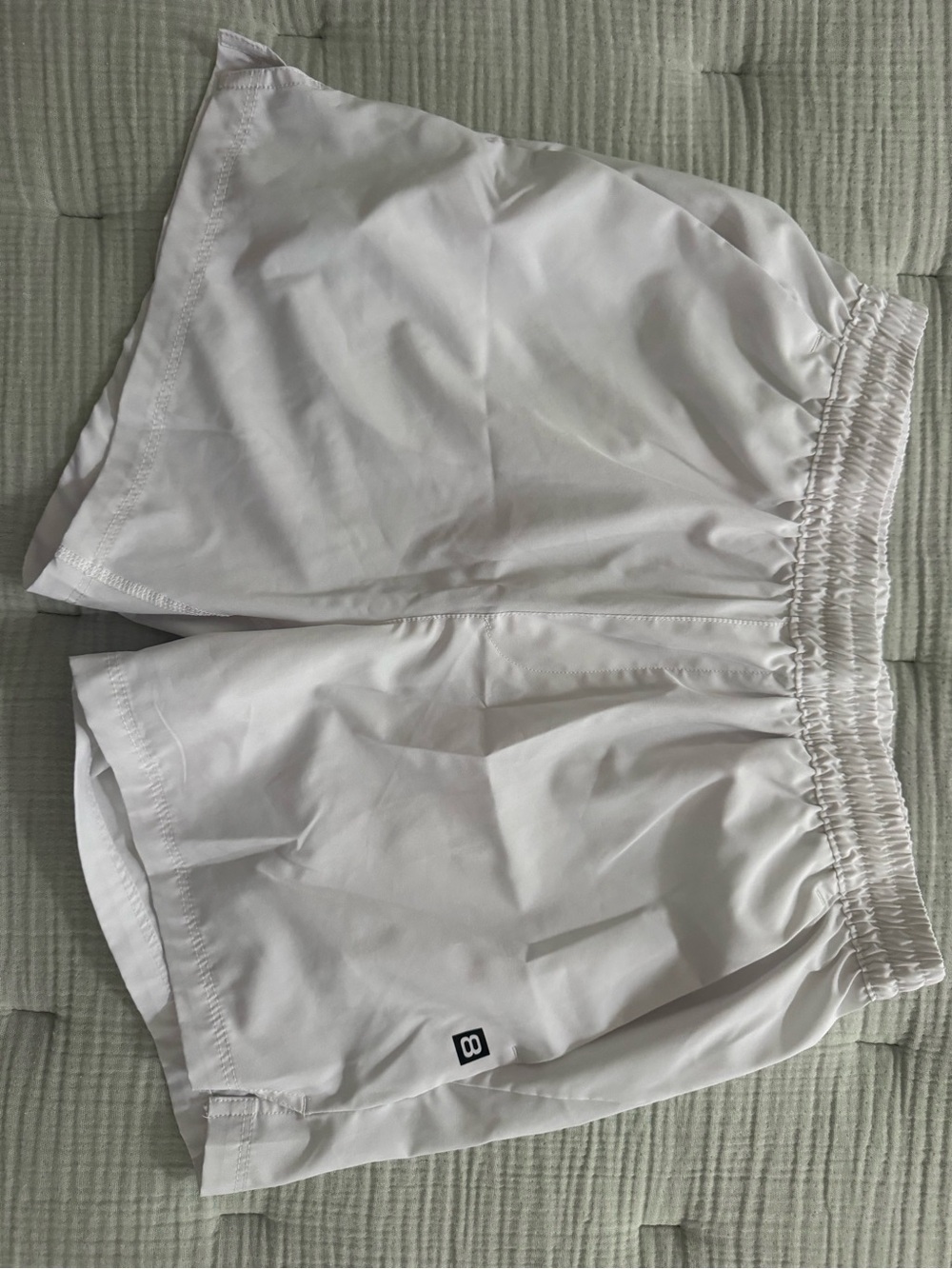 Layer 8 White Performance OWick-Dry Shorts Tag